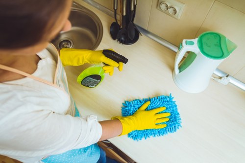 Local rug cleaning service in Harrow restoring a colorful rug to a bright finish